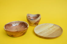 Load image into Gallery viewer, Wooden Plate and Bowl Set on a yellow background.