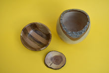 Load image into Gallery viewer, An overhead shot of three different sized hand turned wooden bowls on a yellow background
